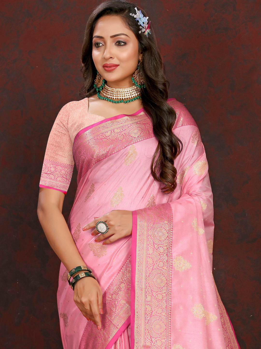 Elegant pink Katan silk saree featuring a graceful zari-adorned pallu, perfect for cultural occasions.