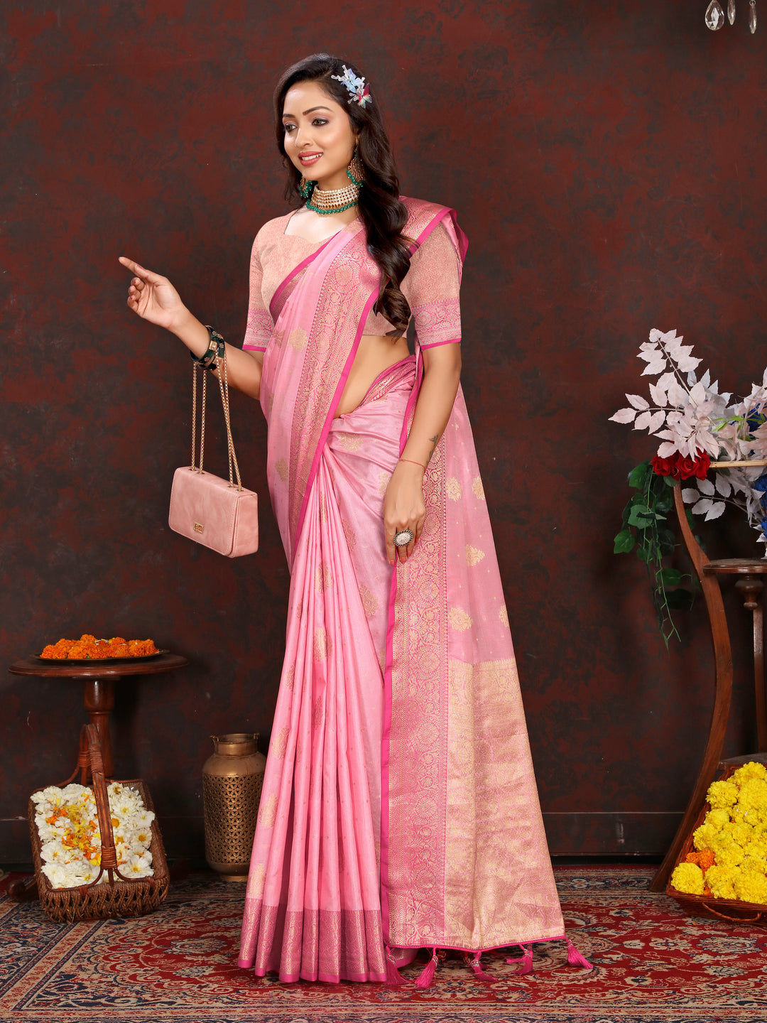 Timeless pink soft Katan silk saree with intricate zari work on the pallu, ideal for elegant gatherings.