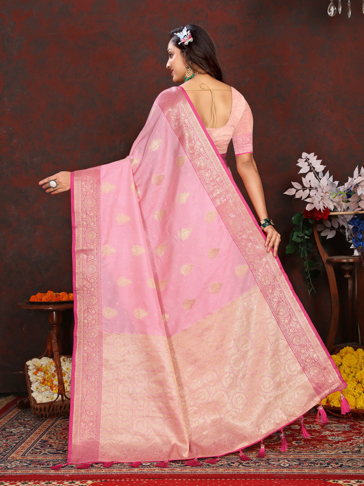 Graceful pink Katan silk saree with delicate zari detailing on the pallu, perfect for weddings and celebrations.