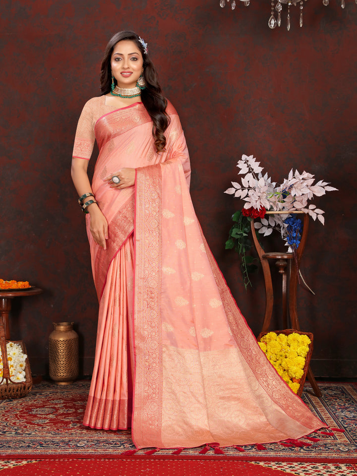 Timeless peach soft Katan silk saree with intricate zari work on the pallu, ideal for festive celebrations.