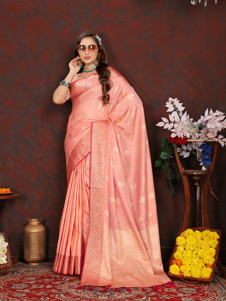 Elegant peach Katan silk saree featuring delicate zari-adorned pallu, perfect for cultural occasions.