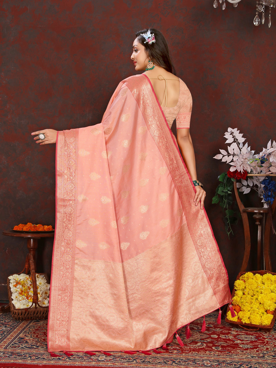 Vibrant peach Katan silk saree with exquisite zari work on the pallu, perfect for weddings and celebrations.