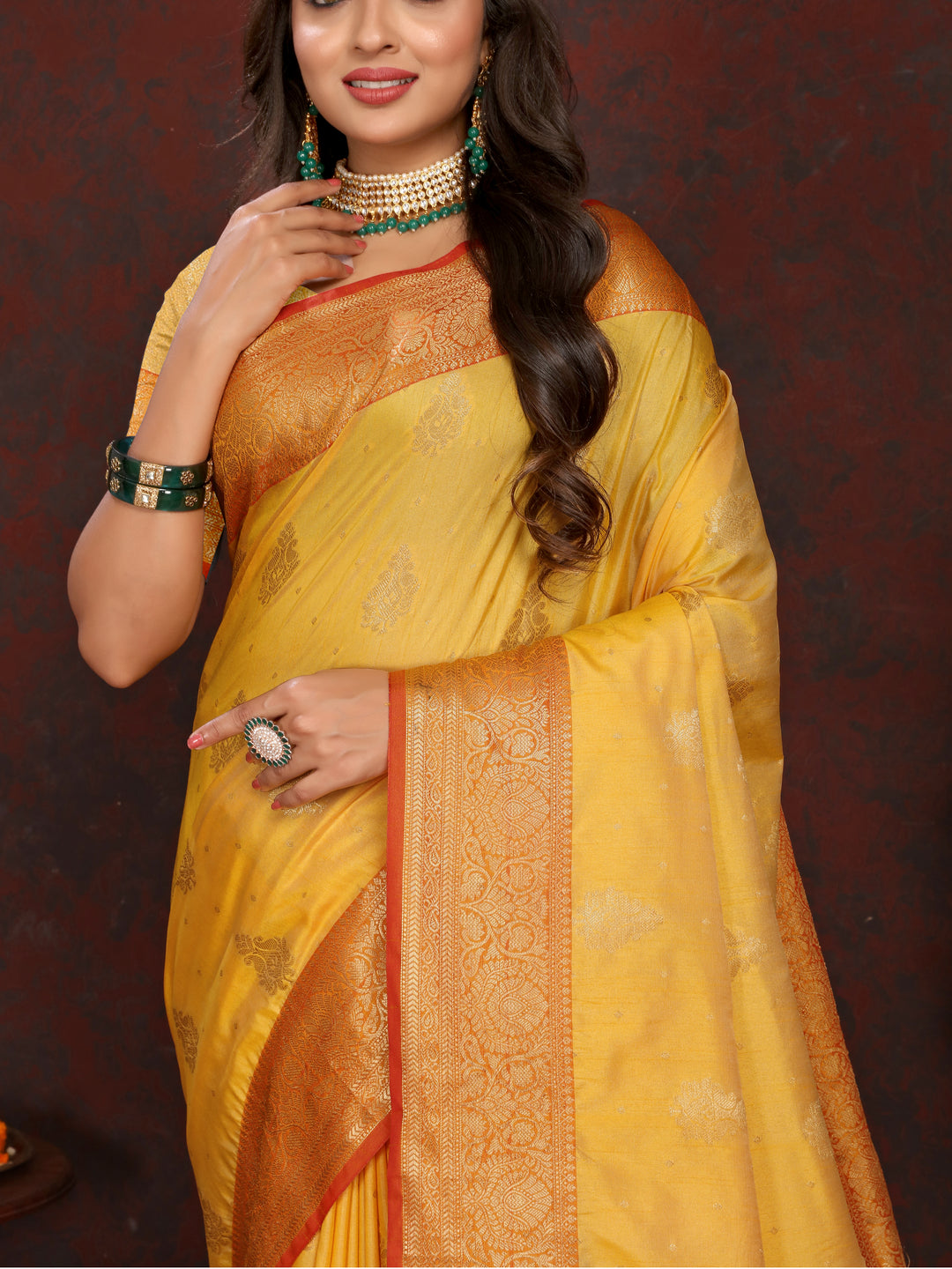 Timeless yellow Katan silk saree with delicate zari detailing on the pallu, perfect for elegant gatherings.