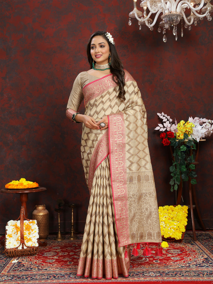 Beige Katan silk saree with intricate zari weaving, perfect for elegant traditional events.