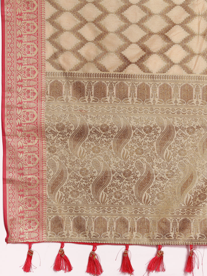 Beige Katan silk saree with intricate zari designs, perfect for traditional gatherings.