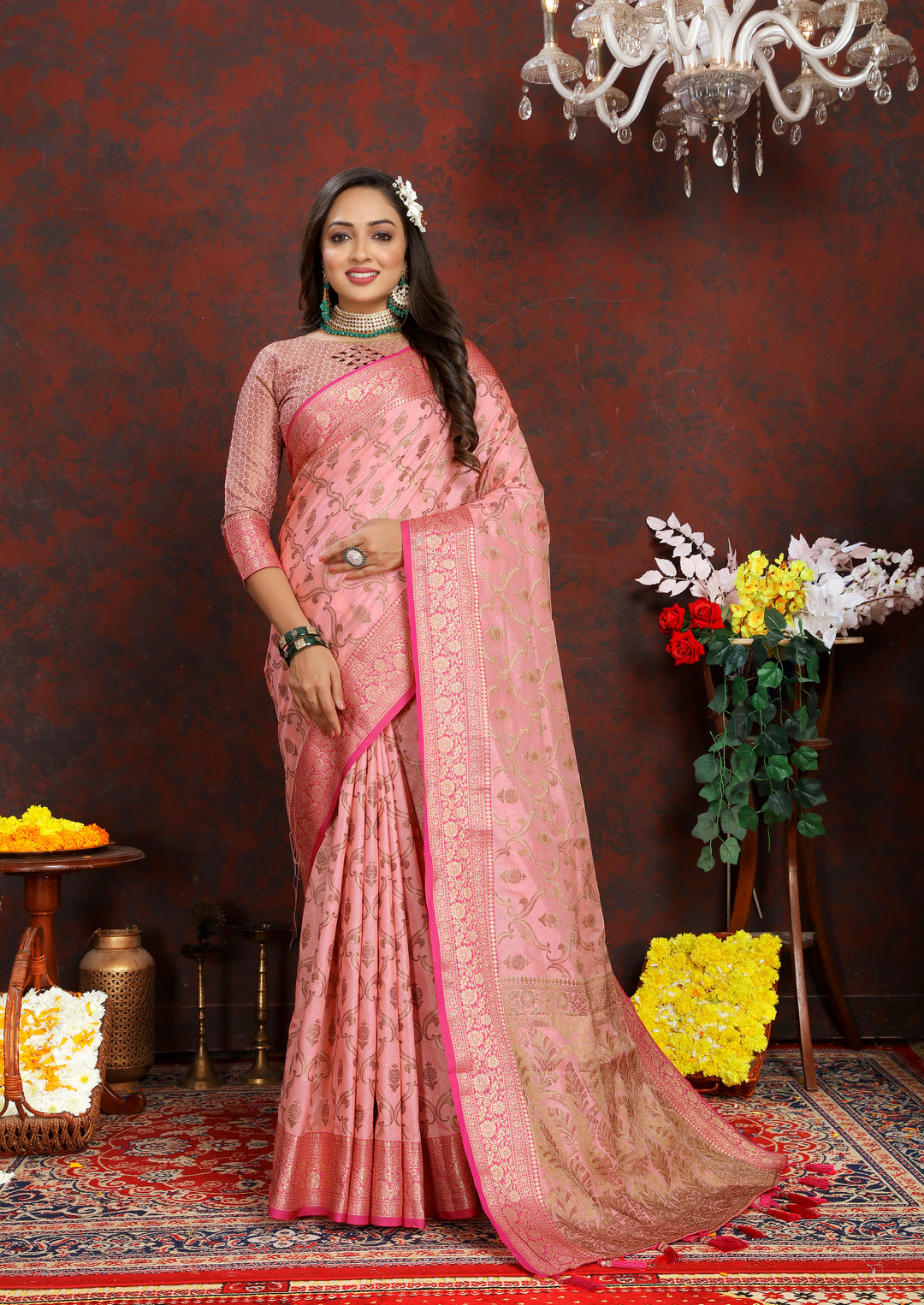 Timeless pink Katan silk saree with matching zari border, tassels, and coordinating blouse piece, ideal for celebrations.