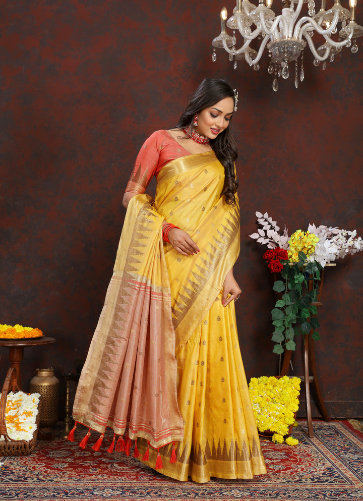 Soft Yellow Silk Saree with delicate zari weaving and an elegant pallu tassel design for festivals.