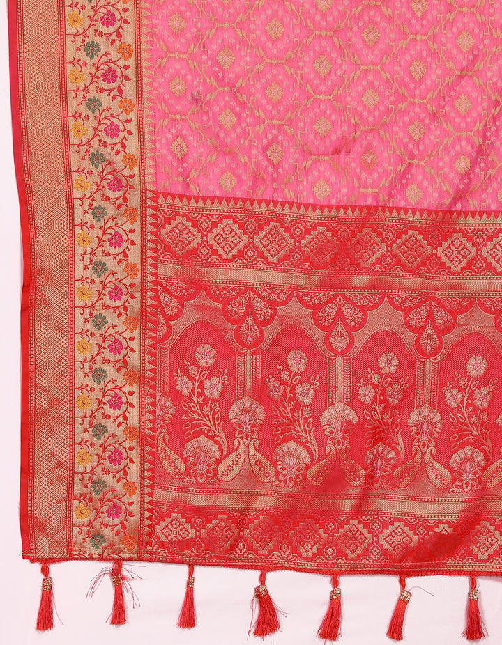 Traditional pink Meenakari organza silk saree featuring a zari border and elegant tassels at the pallu.