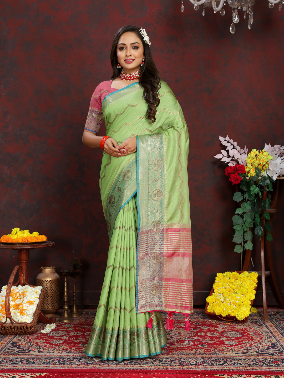 Light-green silk saree with beautiful zari weaving, perfect for cultural and traditional events.