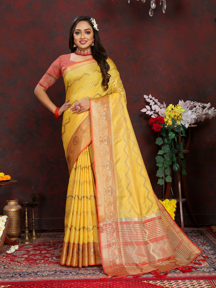 Yellow silk saree with intricate zari weaving, perfect for bridal and festive events.