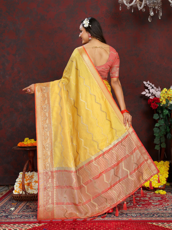 Traditional yellow silk saree with beautiful zari work, ideal for weddings and ceremonies.