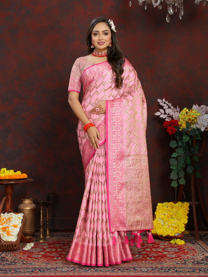 Pink Katan silk saree with luxurious zari weaving, ideal for festive and traditional events.