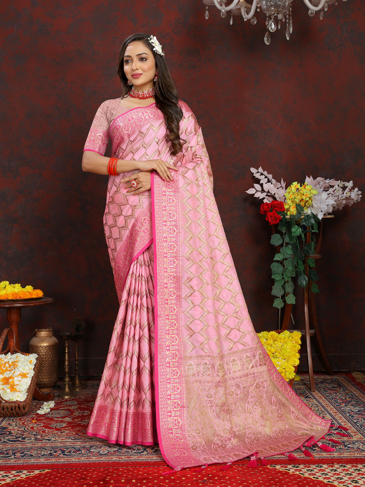 Elegant pink silk saree featuring exquisite zari weaving, perfect for weddings and cultural occasions.