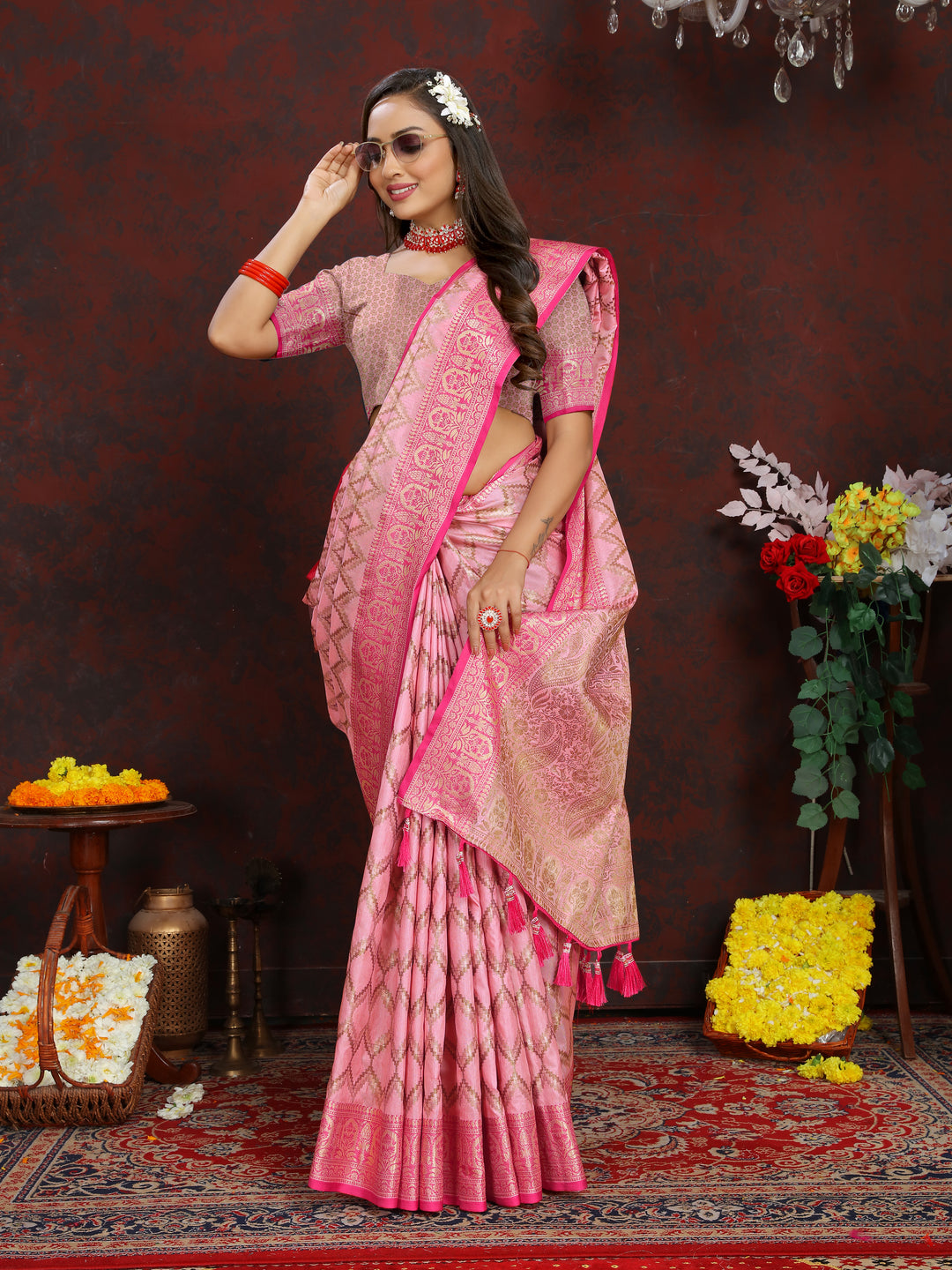 Timeless pink Katan silk saree with intricate zari work, ideal for formal celebrations.