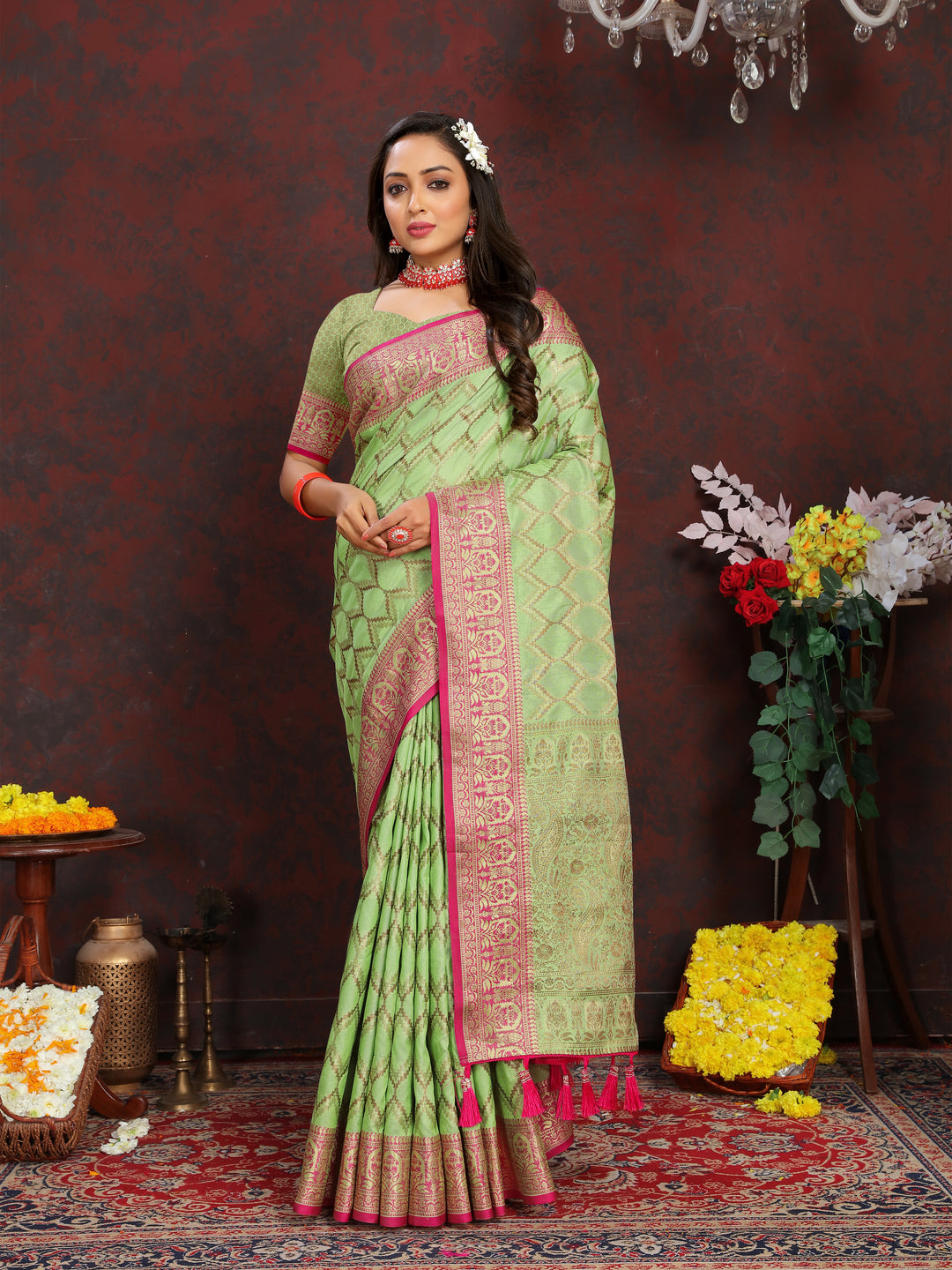 Light-green Katan silk saree with intricate zari weaving, ideal for elegant traditional events.