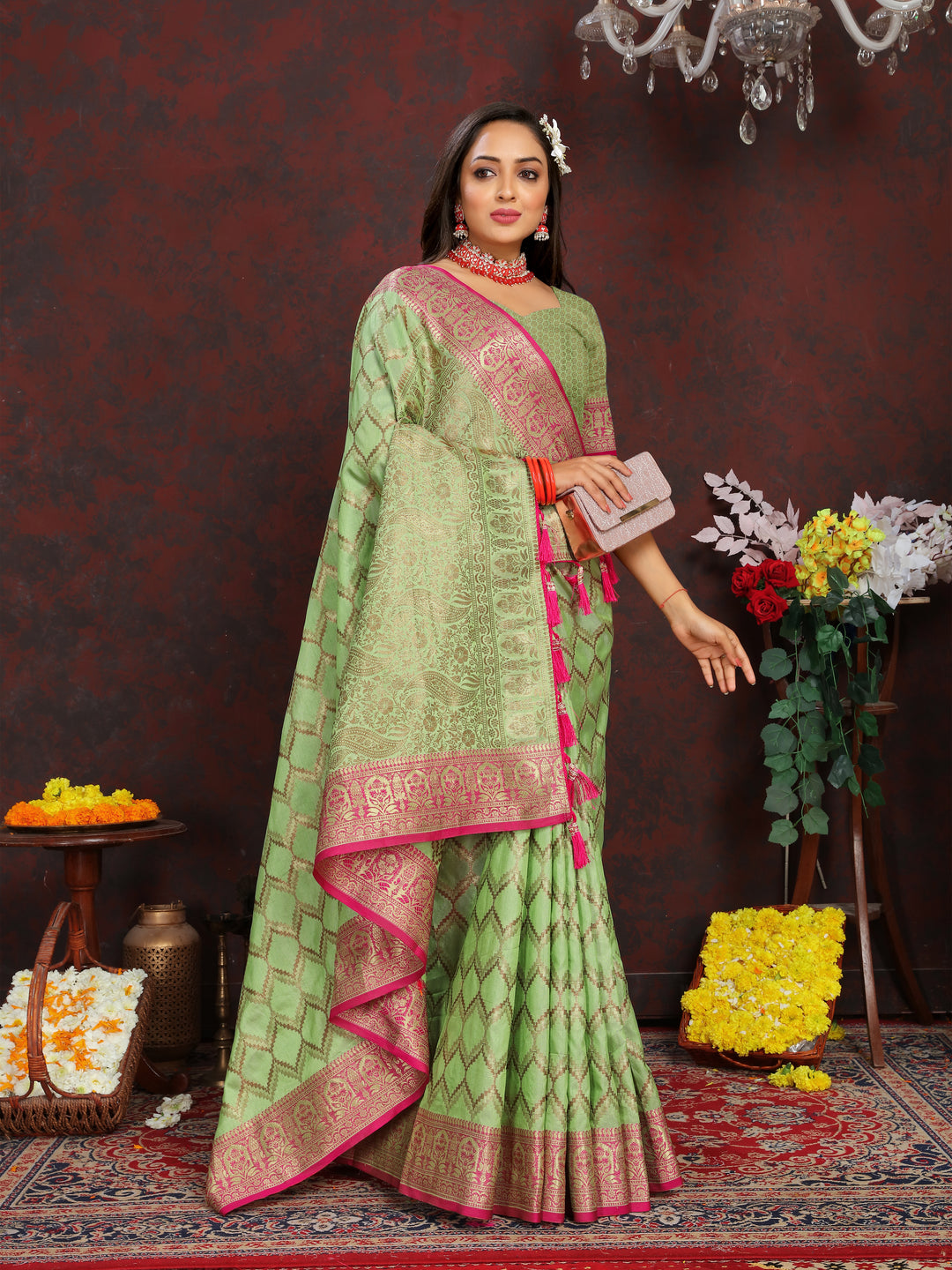 Light-green silk saree featuring beautiful zari weaving, ideal for weddings and traditional events.