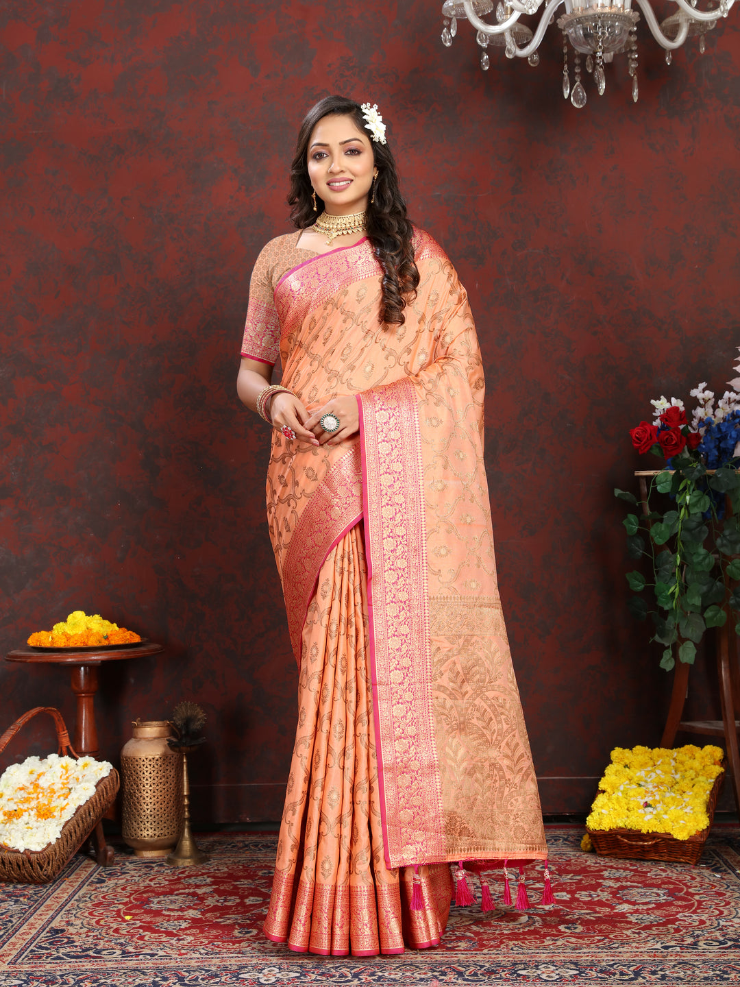 Elegant peach Katan silk saree with intricate zari weaving design and rich zari pallu, perfect for weddings.