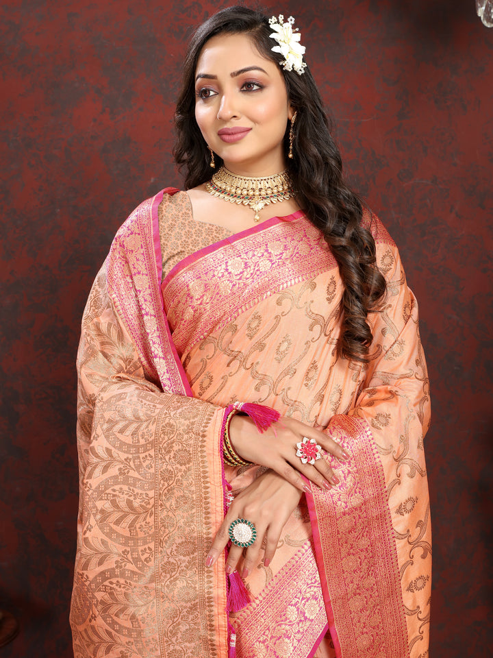 Timeless peach Katan silk saree with a beautiful zari design, crafted for celebrations and formal events.