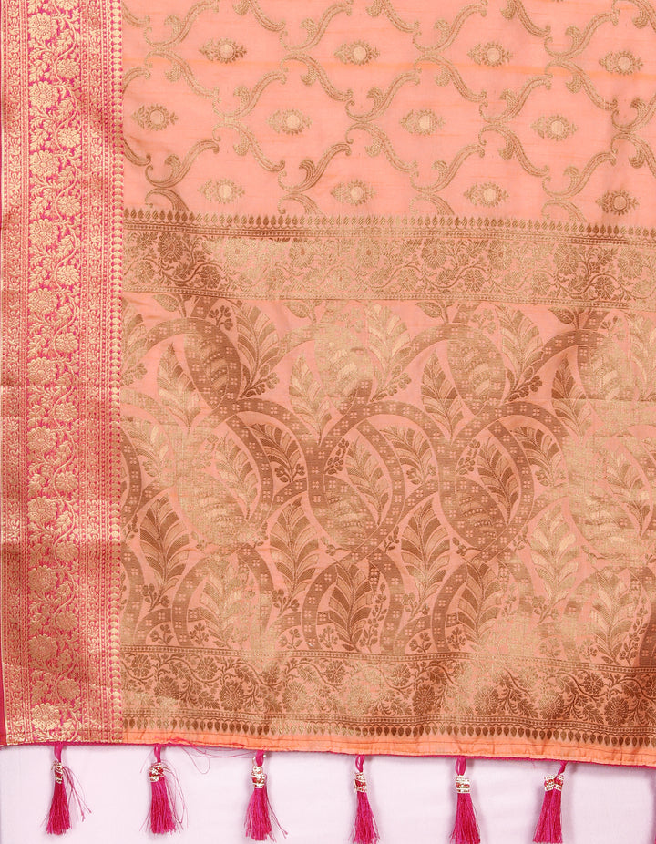 Exquisite peach Katan silk saree with detailed zari border and tassels, a sophisticated choice for weddings.