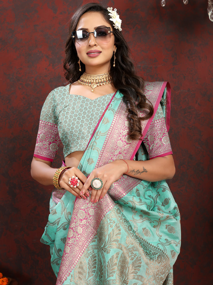 Traditional sea blue Katan silk saree with matching zari border and rich zari pallu, ideal for formal occasions.