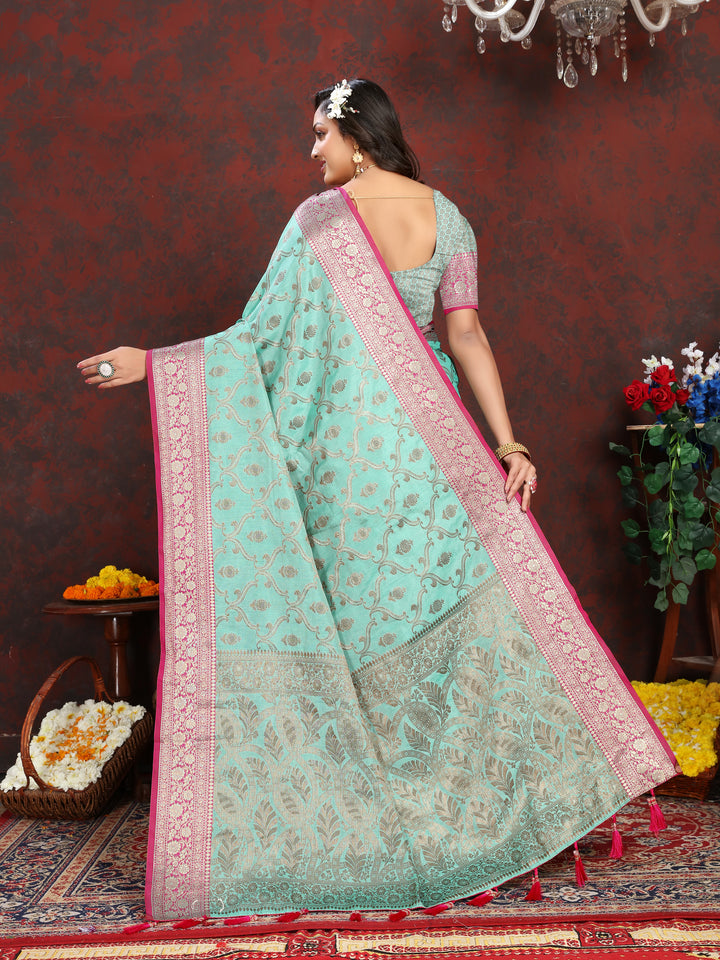 Sophisticated sea blue Katan silk saree with detailed zari work and coordinating blouse piece for weddings.