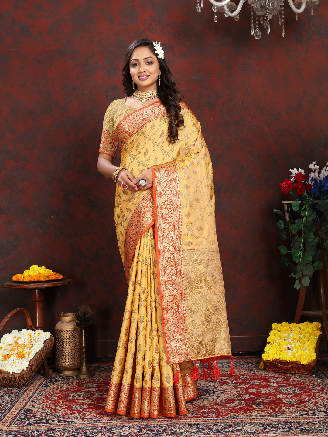 Beautiful yellow Katan silk saree with intricate zari weaving and matching blouse piece, ideal for festive celebrations.