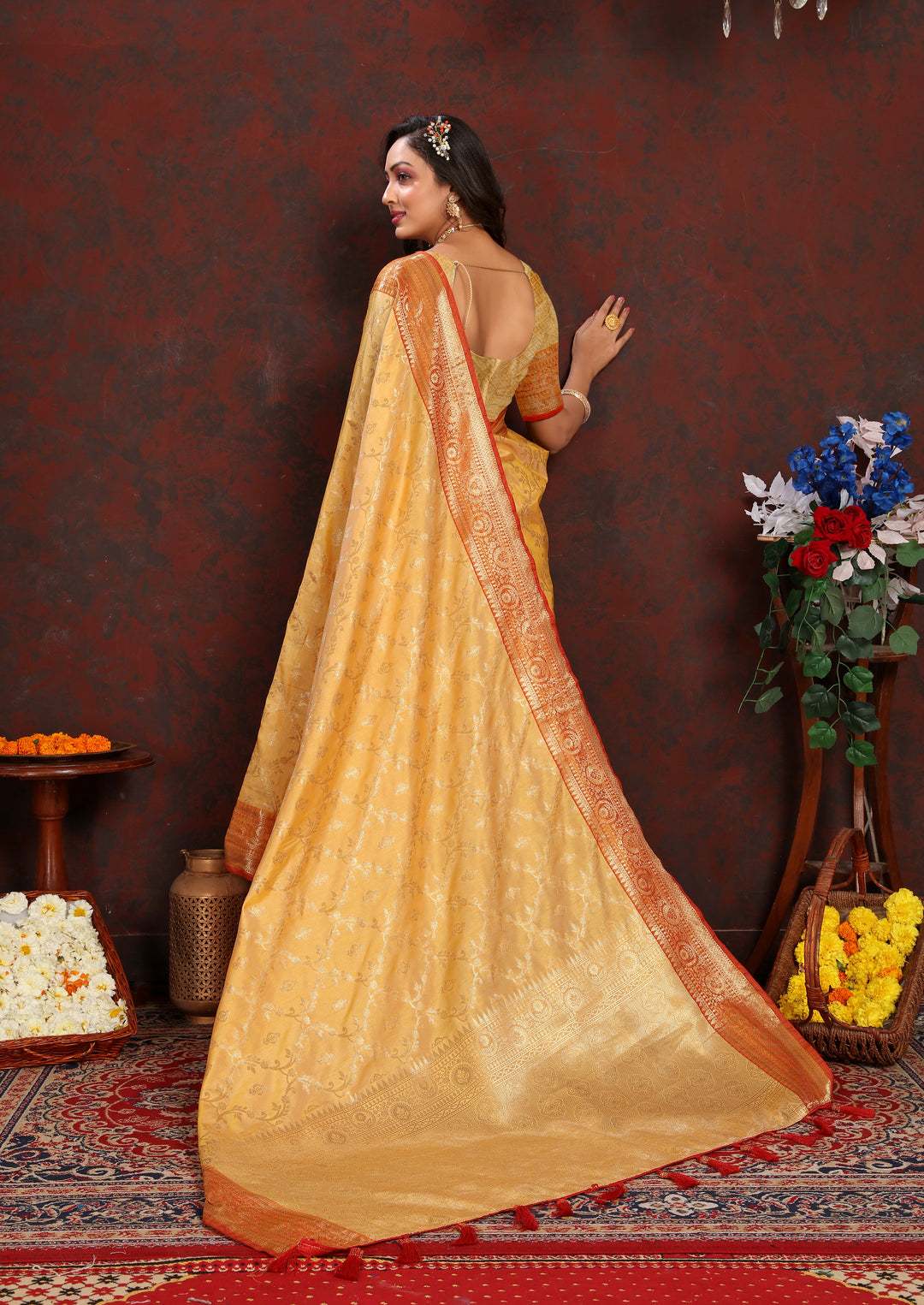 Beautiful mustard yellow Katan silk saree with luxurious zari work, perfect for cultural events.