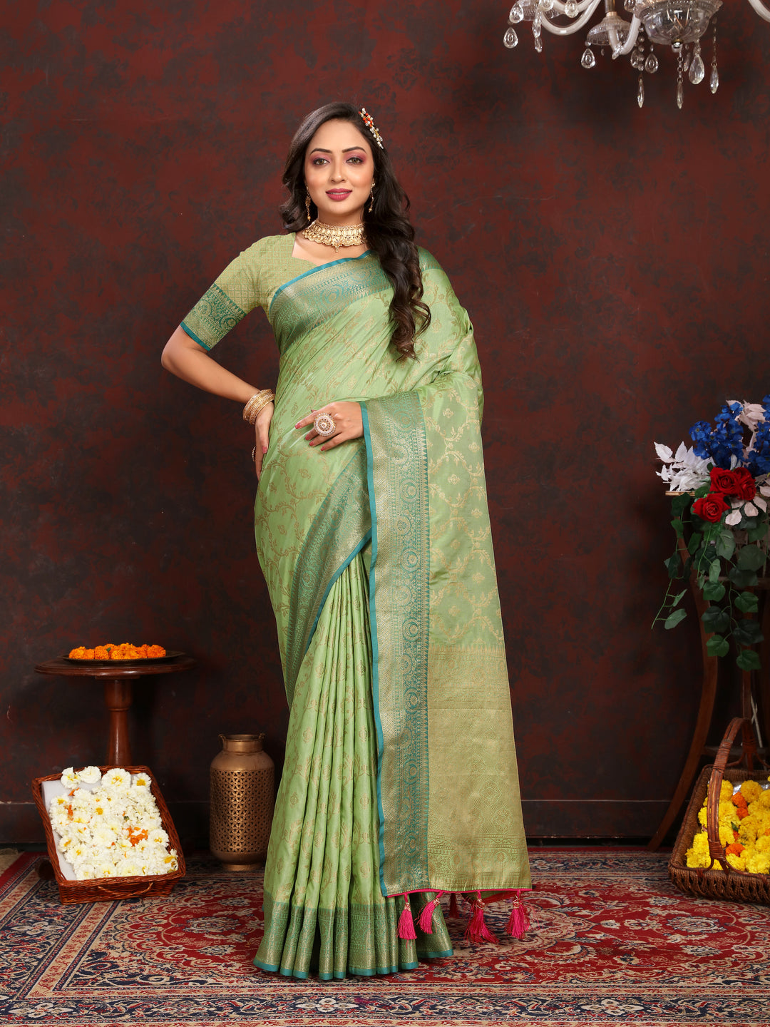 Elegant pista green Katan silk saree with intricate zari weaving, perfect for weddings and grand events.