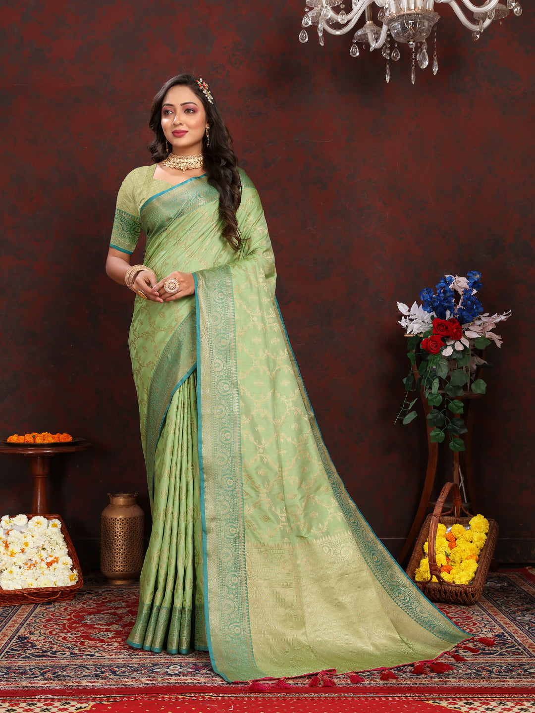 Graceful pista green soft Katan silk saree with beautiful zari work and blouse piece for festive occasions.