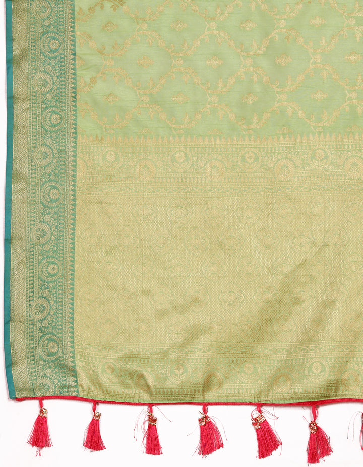 Sophisticated pista green Katan silk saree with exquisite zari weaving, perfect for cultural events.