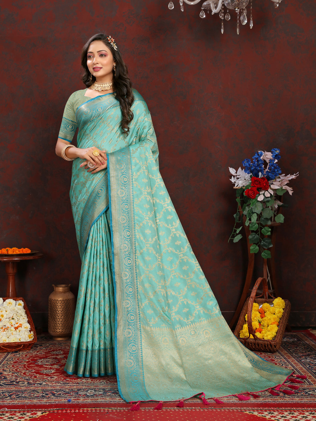 Elegant sea-blue Katan silk saree with intricate zari weaving, ideal for weddings and formal events.