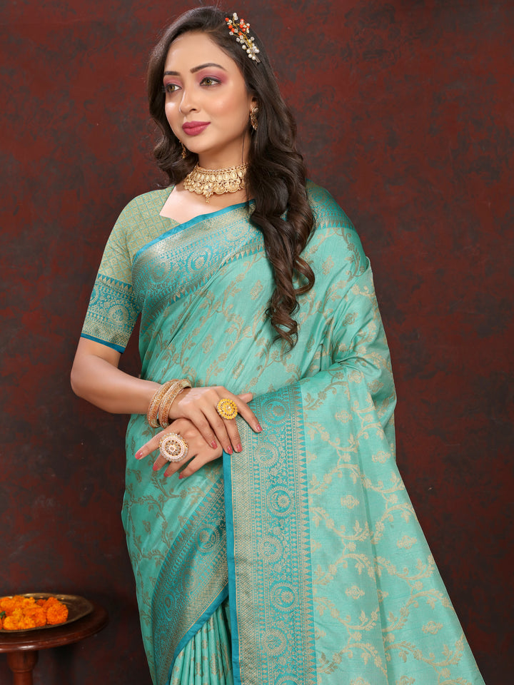 Beautiful sea-blue soft Katan silk saree featuring exquisite zari detailing and matching blouse piece.