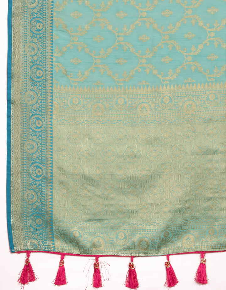 Vibrant sea-blue Katan silk saree with intricate zari detailing, perfect for cultural events.