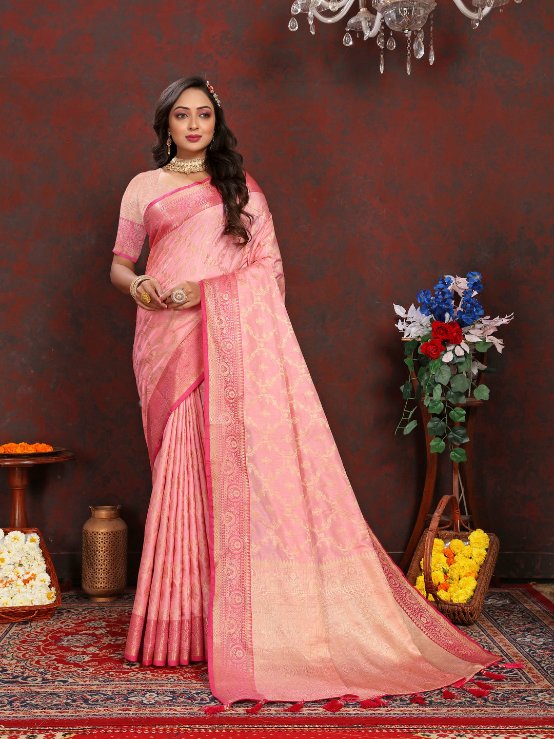 Beautiful pink Katan silk saree with intricate zari work, perfect for weddings and festive gatherings.