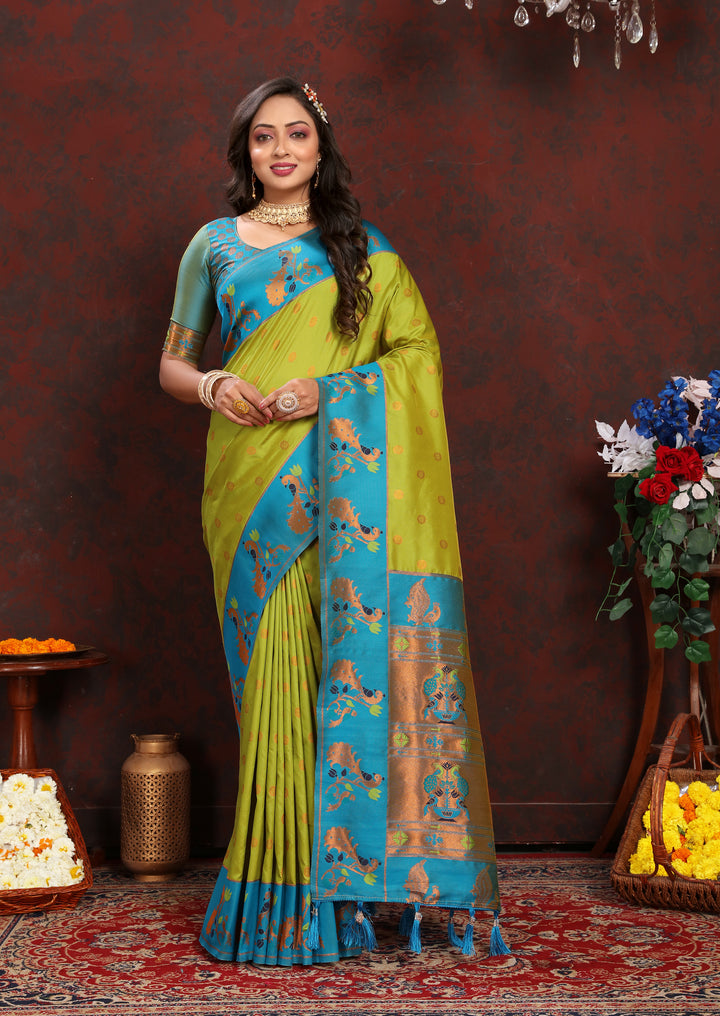 Graceful sea-blue Paithani Saree with contrast zari border, perfect for special occasions.