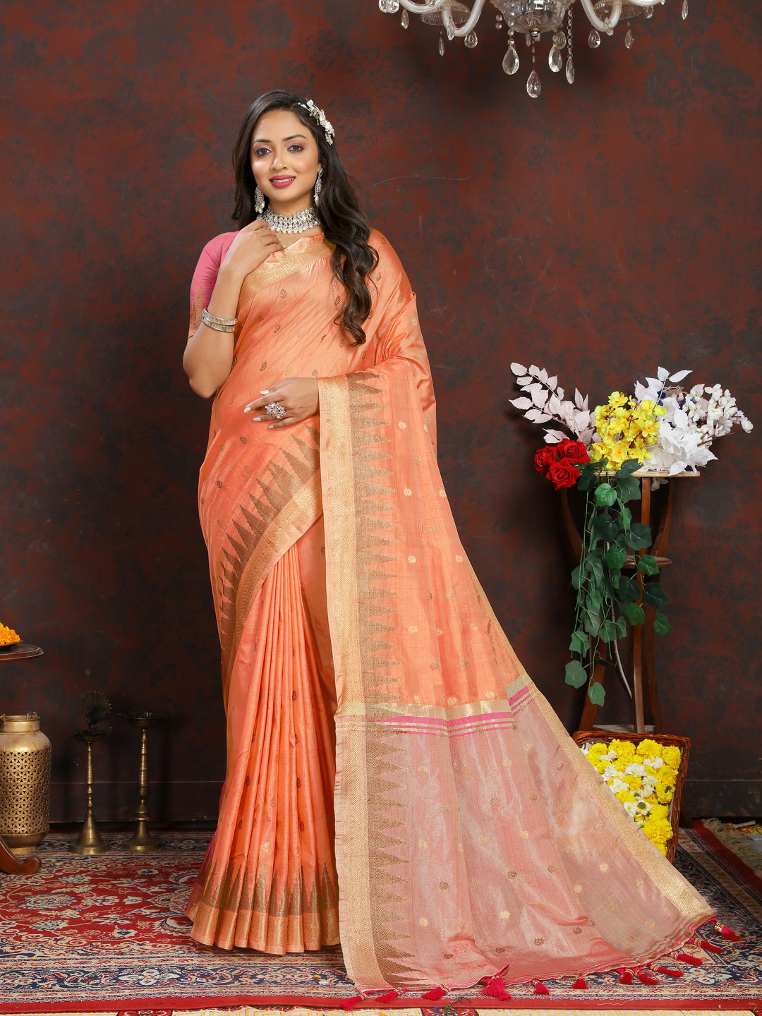 Stunning Orange Katan Silk Saree with delicate zari weaving and pallu tassels, perfect for traditional events.