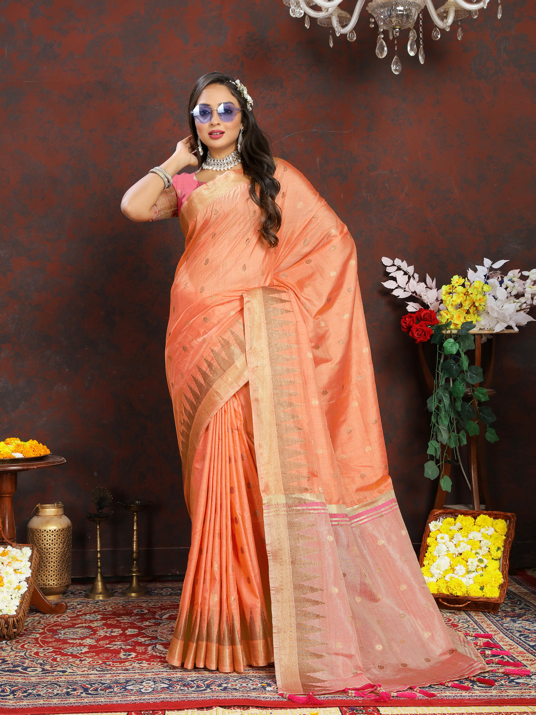 Premium Orange Katan Silk Saree with intricate zari weaving and a stylish pallu tassel design.