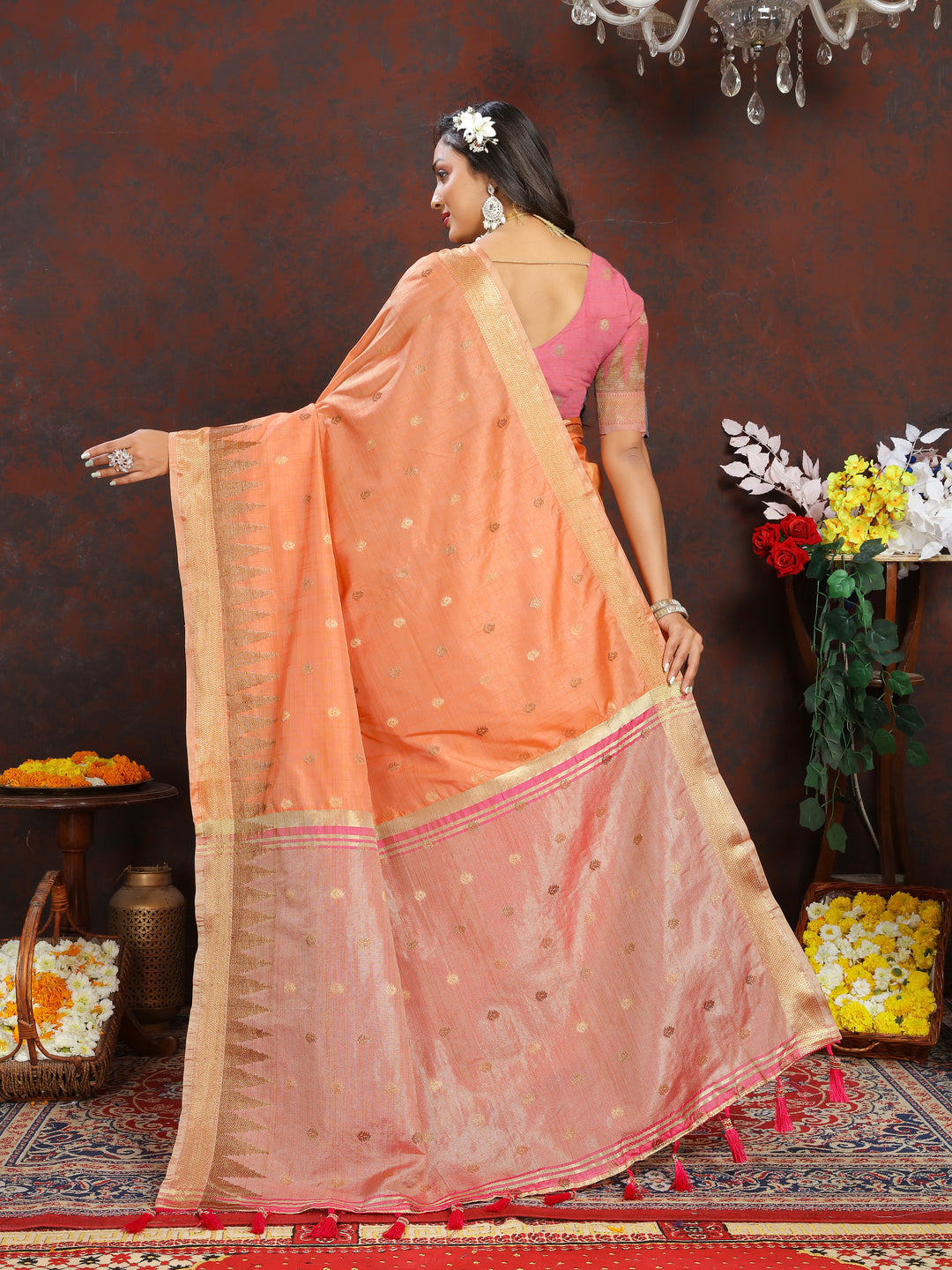  Radiant Orange Silk Saree featuring detailed zari weaving and pallu tassels for festive occasions.