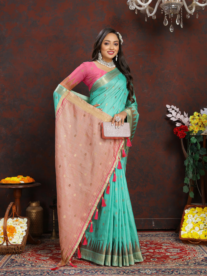 Stunning Sea-Blue Silk Saree with intricate zari weaving and pallu tassels, perfect for traditional wear.