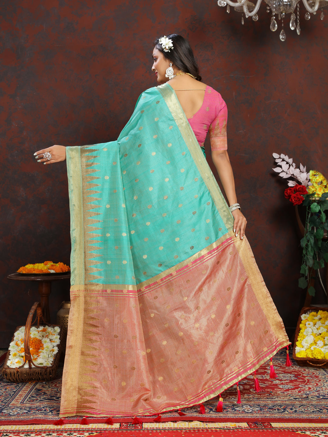 Soft Sea-Blue Katan Silk Saree with detailed zari design and stylish pallu tassels for celebrations.