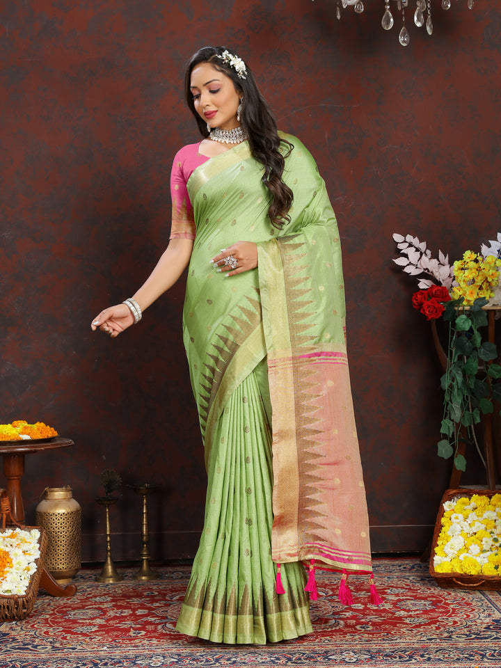 Beautiful Sea-Blue Katan Silk Saree with rich zari weaving and a designer pallu with tassels for special occasions.