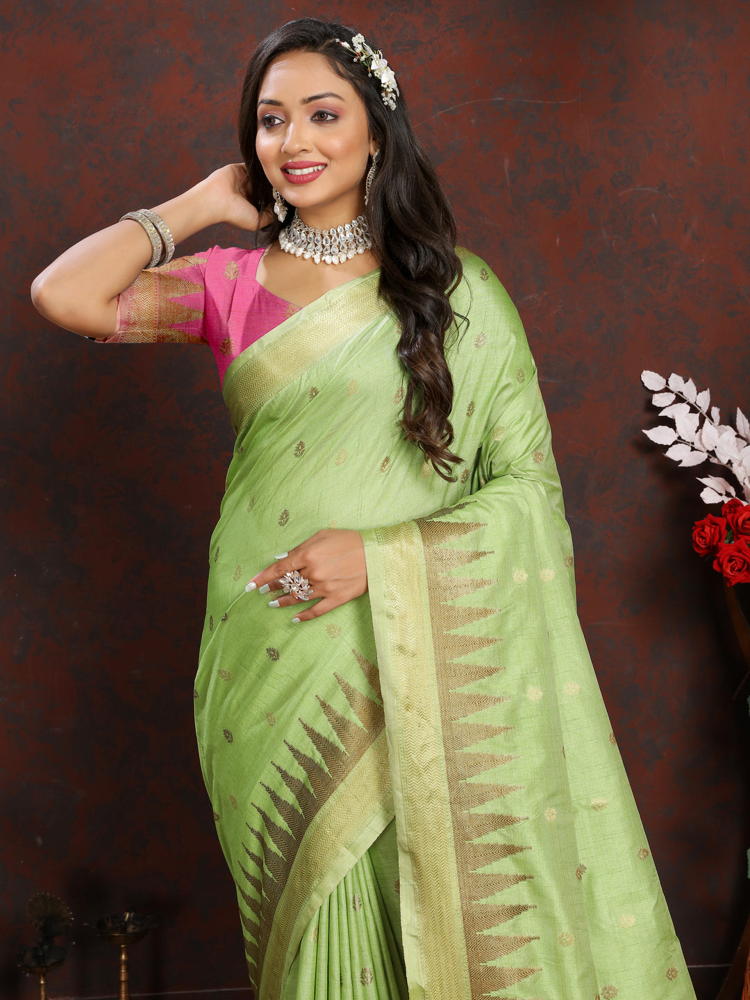 Gorgeous Light-Green Silk Saree with rich zari weaving and exquisite pallu tassels for festive occasions.