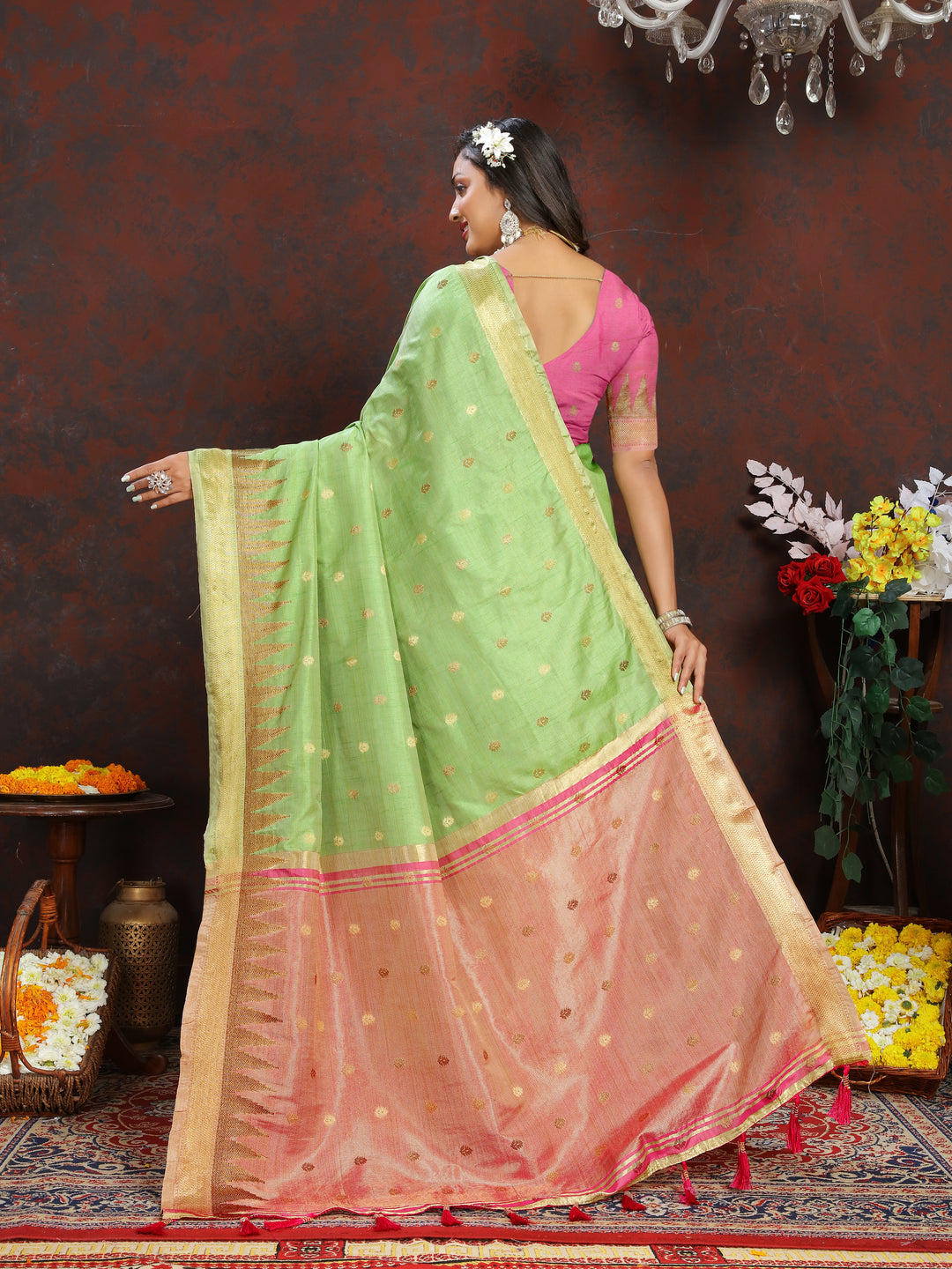 Stunning Light-Green Silk Saree with intricate zari design and pallu tassels for traditional events.