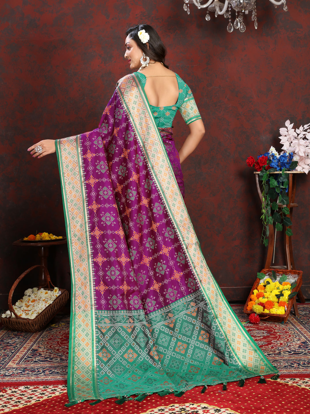 Vibrant Purple Patola Silk Saree with rich meenakari work and a stylish pallu design for festive events.