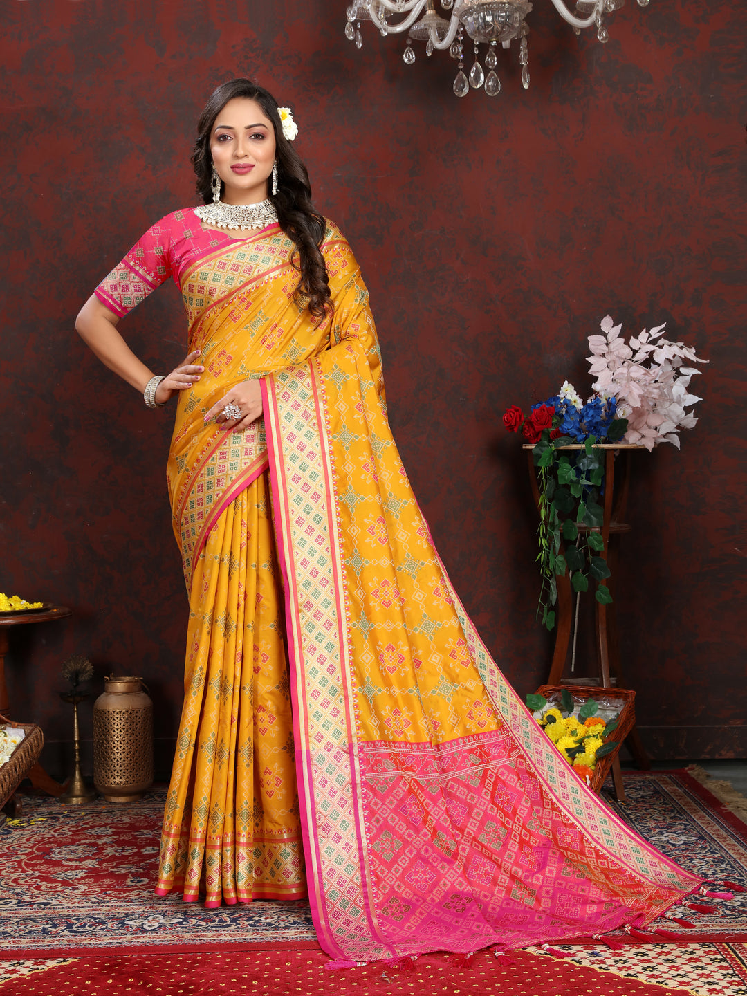 Radiant Yellow Silk Saree with dazzling meenakari work and a stylish pallu design for weddings.