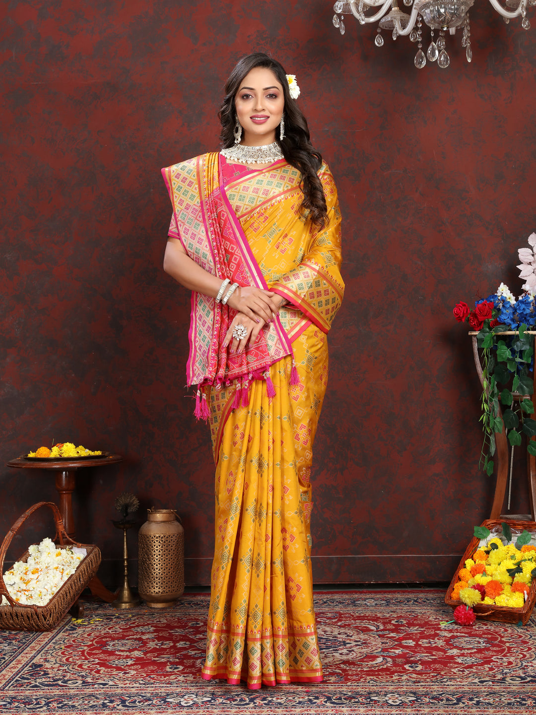 Premium Yellow Patola Silk Saree with intricate meenakari work and dreamy pallu style for bridal wear.