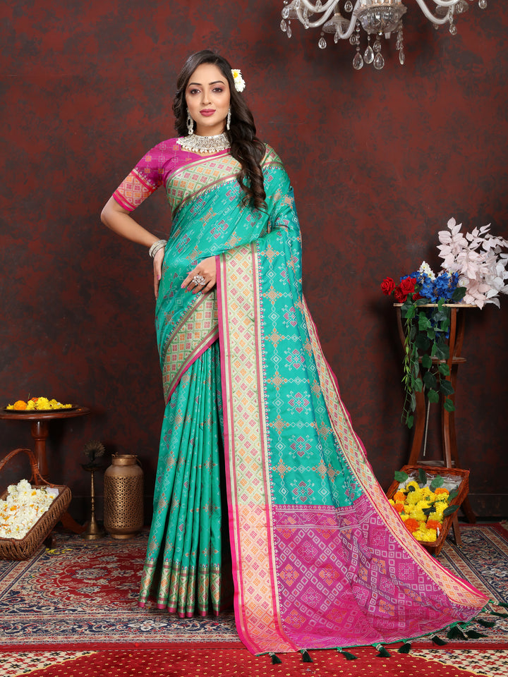 Elegant Sea-Green Silk Saree featuring dazzling meenakari work and a dreamy pallu for traditional occasions.