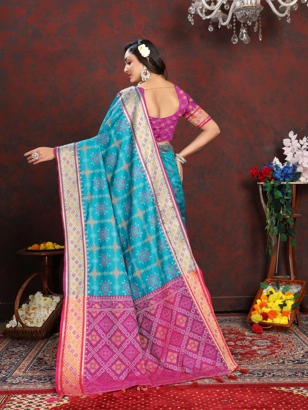 Beautiful Sea-Blue Silk Saree with detailed meenakari work and elegant pallu design for traditional occasions.