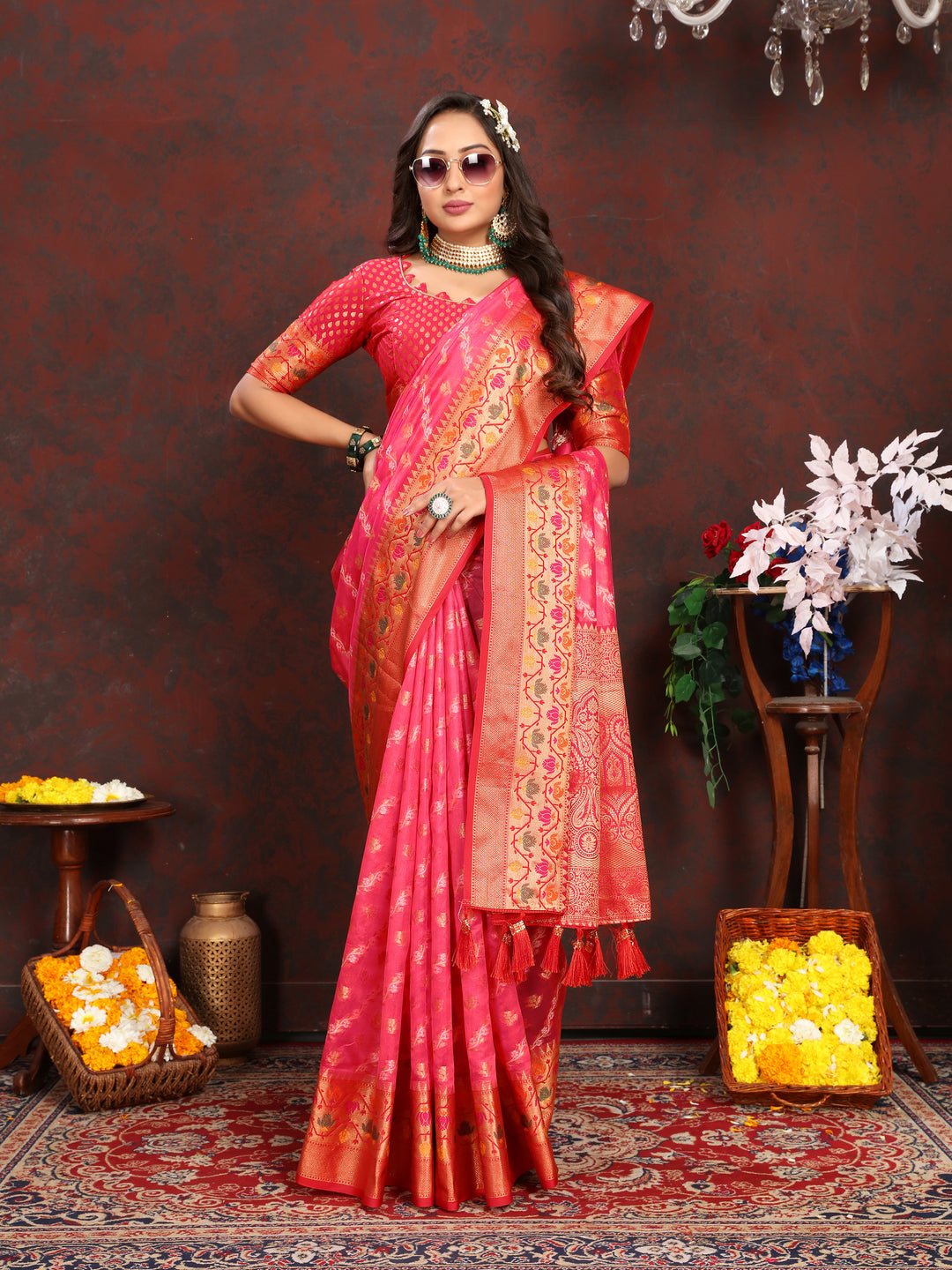 Classic red organza saree with exquisite embroidery and matching blouse piece, perfect for cultural events.