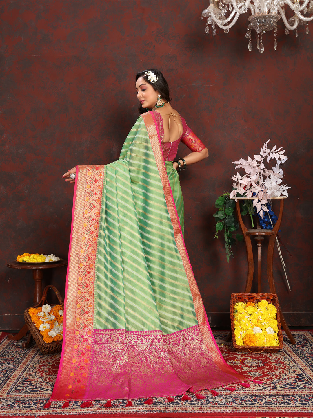 Premium Pista-Green Organza Saadi with rich embroidery and traditional luxury style for festive celebrations.